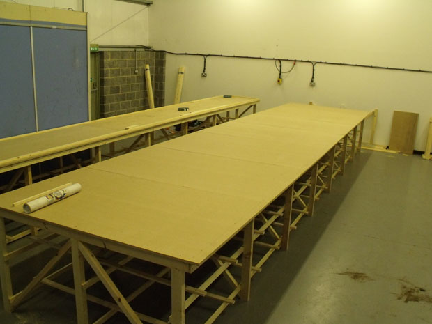 Two of the tables take shape